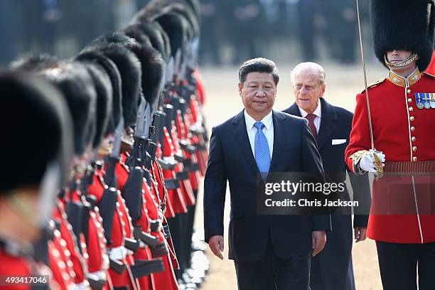 Chinese President Xi Jinping reviews a Guard of Honour on Horseguards Parade during the Official Ceremonial Welcome for the Chinese State Visit on...