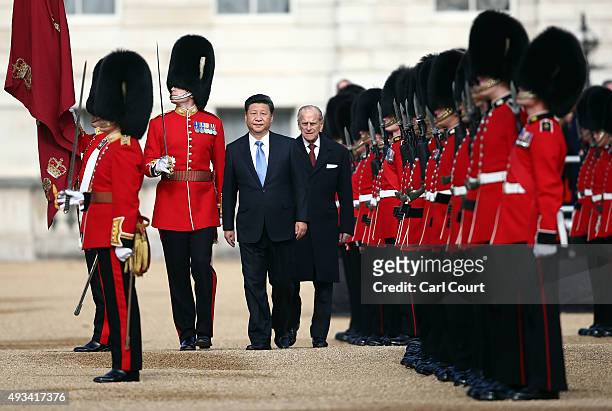 China's President, Xi Jinping, accompanied by Prince Philip reviews an honour guard on October 20, 2015 in London, England. The President of the...