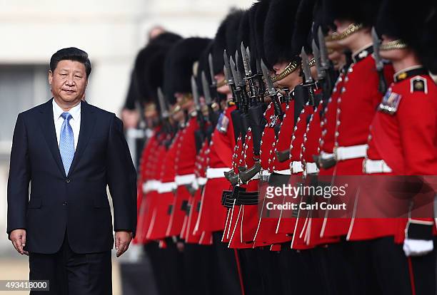 China's President, Xi Jinping , accompanied by Prince Philip reviews an honour guard on October 20, 2015 in London, England. The President of the...