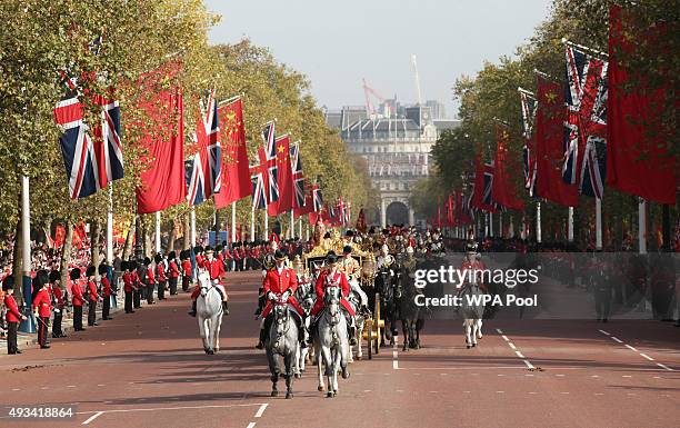 Queen Elizabeth II and President of The People's Republic of China, Xi Jinping, ride in the Diamond Jubilee State Coach along The Mall after the...