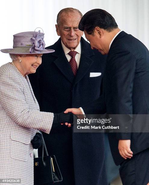 Queen Elizabeth II and Prince Philip, Duke of Edinburgh greet President Xi Jinping at the Official Ceremonial Welcome for the Chinese State Visit on...