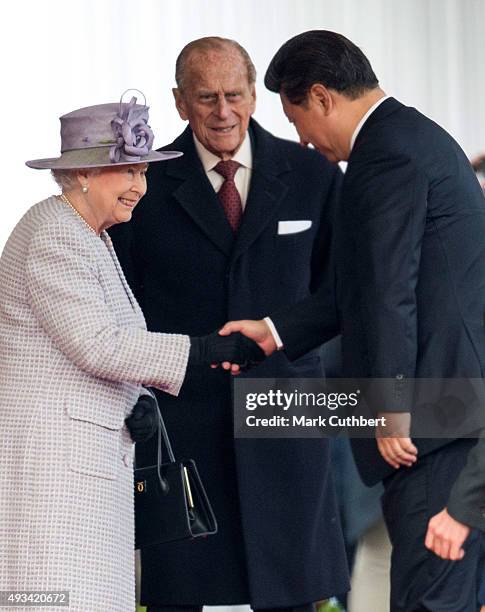 Queen Elizabeth II and Prince Philip, Duke of Edinburgh greet President Xi Jinping at the Official Ceremonial Welcome for the Chinese State Visit on...