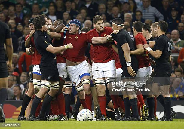 Alexandre Flanquart and Pascal Pape of France argue with the All Blacks during the 2015 Rugby World Cup Quarter Final match between New Zealand and...