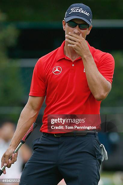 Adam Scott of Australia reacts to a missed putt on the 16th hole during Round Two of the Crowne Plaza Invitational at Colonial on May 23, 2014 at...