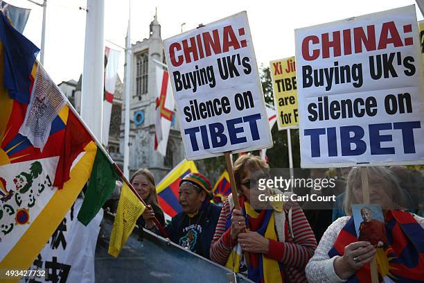 Tibetan independence activists demonstrate near Parliament ahead of a visit by China's President, Xi Jinping on October 20, 2015 in London, England....