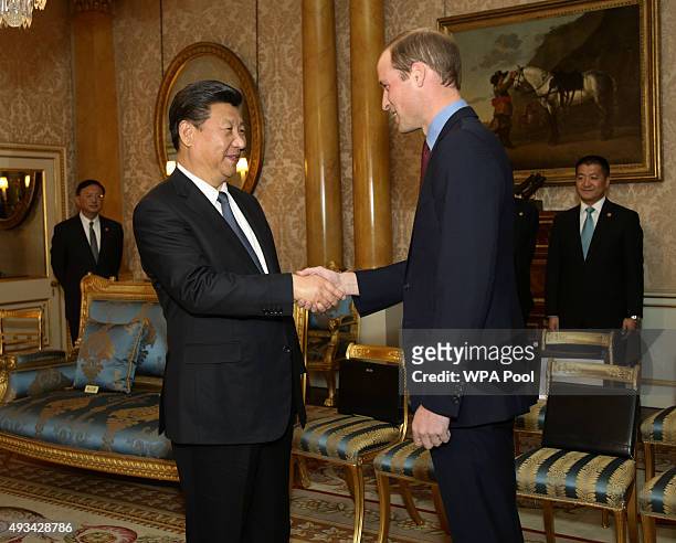 Prince William, Duke of Cambridge shakes hands with the China's President, Xi Jinping on the first day of the President's state visit on October 20,...