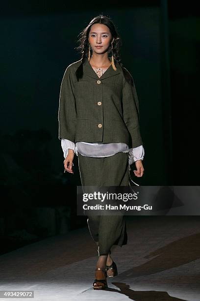 Model showcases designs on the runway during the 'Miss Gee Collection' show as part of HERA Seoul Fashion Week S/S 2016 at DDP on October 20, 2015 in...