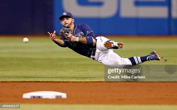 Second baseman Sean Rodriguez of the Tampa Bay Rays makes a throw to second base after fielding a hit by Jackie Bradley Jr. #25 of the Boston Red Sox...