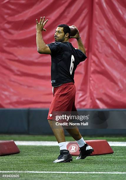 Logan Thomas of the Arizona Cardinals throws a pass during a Rookie Minicamp practice on May 23, 2014 in Tempe, Arizona.