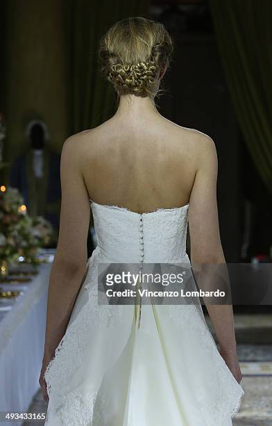 Model walks the runway during the Enzo Miccio Bridal Collection on May 23, 2014 in Milan, Italy.