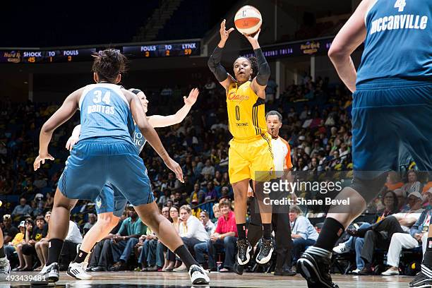 Odyssey Sims of the Tulsa Shock shoots against Damiris Dantas of the Minnesota Lynx during the WNBA game on May 23, 2014 at the BOK Center in Tulsa,...