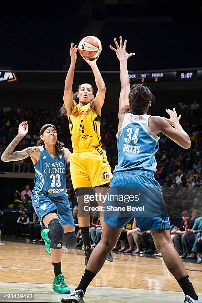 Skylar Diggins of the Tulsa Shock shoots against Damiris Dantas of the Minnesota Lynx during the WNBA game on May 23, 2014 at the BOK Center in...