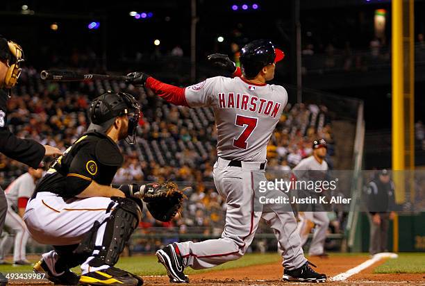 Scott Hairston of the Washington Nationals hits a sacrifice fly in the eighth inning against the Pittsburgh Pirates during the game at PNC Park May...