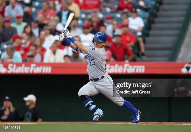Norichika Aoki of the Kansas City Royals hits a base hit against the Los Angeles Angels of Anaheim in the first inning at Angel Stadium of Anaheim on...