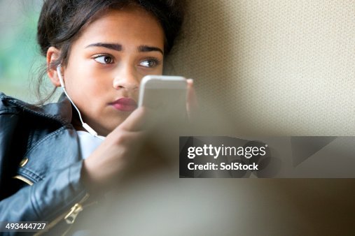 Teenager on her mobile phone Teenager on her mobile phone