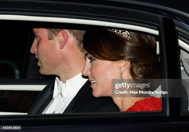 Prince William, Duke of Cambridge and Catherine, Duchess of Cambridge wearing a tiara made by Garrard London arrives at Buckingham Palace to attend a...