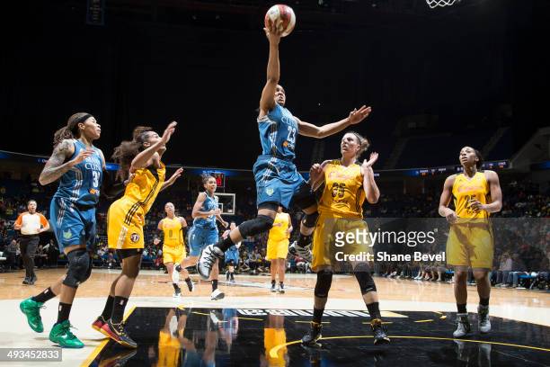 Maya Moore of the Minnesota Lynx shoots against Jordan Hooper of the Tulsa Shock during the WNBA game on May 23, 2014 at the BOK Center in Tulsa,...