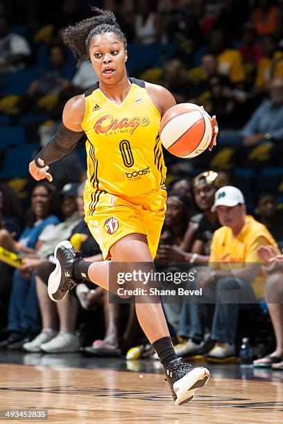 Odyssey Sims of the Tulsa Shock moves the ball downcourt during the WNBA game against the Minnesota Lynx on May 23, 2014 at the BOK Center in Tulsa,...