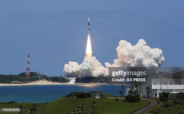 Japan's H-IIA rocket lifts off from the space centre on the southern island of Tanegashima on May 24, 2014. Japan successfully launched a new mapping...