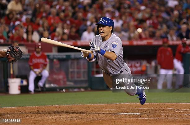 Norichika Aoki of the Kansas City Royals is hit by a pitch in the seventh against the Los Angeles Angels of Anaheim at Angel Stadium of Anaheim on...