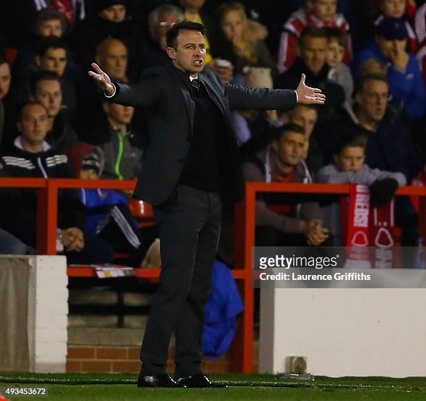 Dougie Freedman of Nottingham Forest gestures from the bench during the Sky Bet Championship match between Nottingham Forest and Burnley at City...