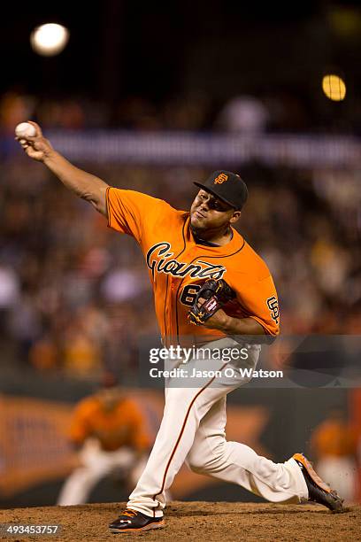 Jean Machi of the San Francisco Giants pitches against the Minnesota Twins during the ninth inning at AT&T Park on May 23, 2014 in San Francisco,...