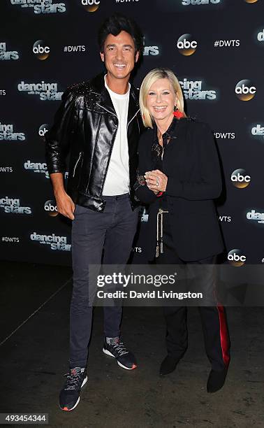 Personality Dominic Bowden and actress/singer Olivia Newton-John attend 'Dancing with the Stars' Season 21 at CBS Television City on October 19, 2015...