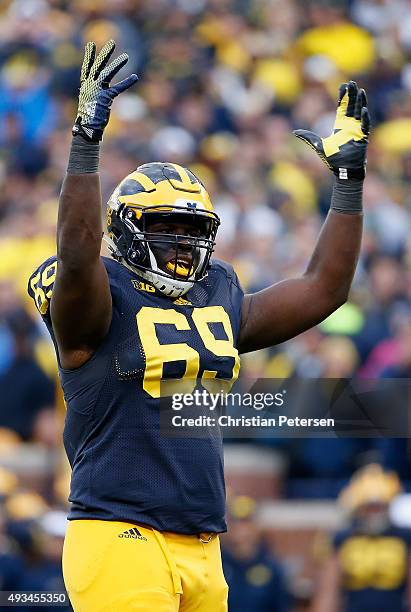 Defensive tackle Willie Henry of the Michigan Wolverines reacts during the college football game against the Michigan State Spartans at Michigan...