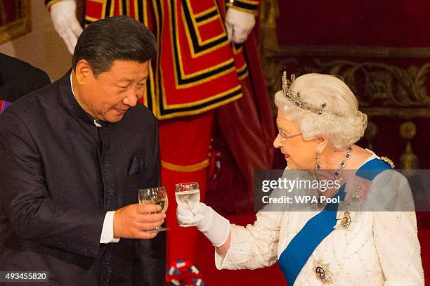 President of China Xi Jinping and Britain's Queen Elizabeth II attend a state banquet at Buckingham Palace on October 20, 2015 in London, England....