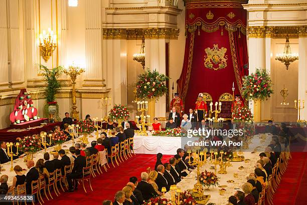 Catherine, Duchess of Cambridge, President of China Xi Jinping and Prince Philip, Duke of Edinburgh listen to Britain's Queen Elizabeth II speaks...