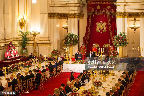 Catherine, Duchess of Cambridge, Britain's Queen Elizabeth II and Prince Philip, Duke of Edinburgh listen as President of China Xi Jinping speaks...