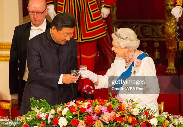 President of China Xi Jinping and Britain's Queen Elizabeth II attend a state banquet at Buckingham Palace on October 20, 2015 in London, England....