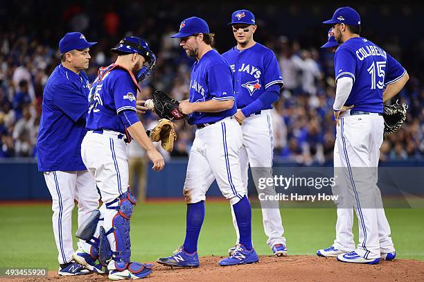 Dickey of the Toronto Blue Jays is relieved in the second inning against the Kansas City Royals during game four of the American League Championship...