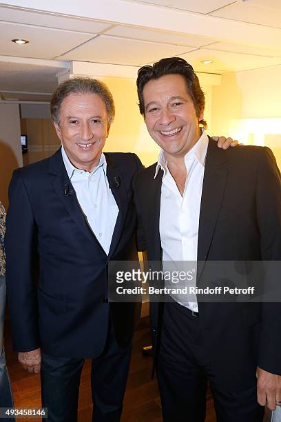 Presenter of the show Michel Drucker and Main Guest of the Show, Impersonator Laurent Gerra attend the 'Vivement Dimanche' French TV Show at Pavillon...