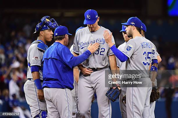 Chris Young of the Kansas City Royals is relieved in the fifth inning against the Toronto Blue Jays during game four of the American League...