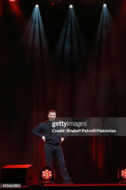 Humorist Jean-Marie Bigard performs in his One Man Show 'Bigard Fete Ses 60 Ans' at Le Grand Rex on May 23, 2014 in Paris, France.