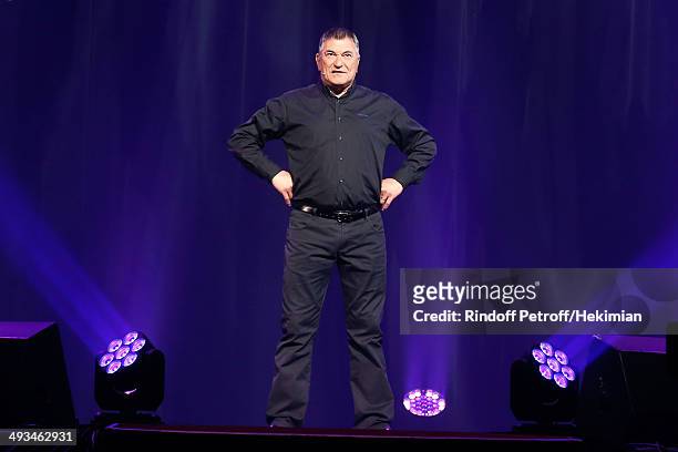 Humorist Jean-Marie Bigard performs in his One Man Show 'Bigard Fete Ses 60 Ans' at Le Grand Rex on May 23, 2014 in Paris, France.