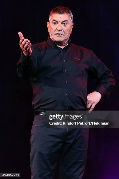 Humorist Jean-Marie Bigard performs in his One Man Show 'Bigard Fete Ses 60 Ans' at Le Grand Rex on May 23, 2014 in Paris, France.