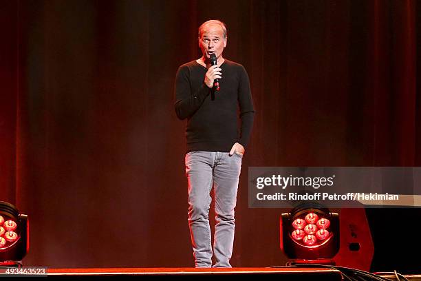 Laurent Baffie heats the room at the 'Bigard Fete Ses 60 Ans' One Man Show at Le Grand Rex on May 23, 2014 in Paris, France.