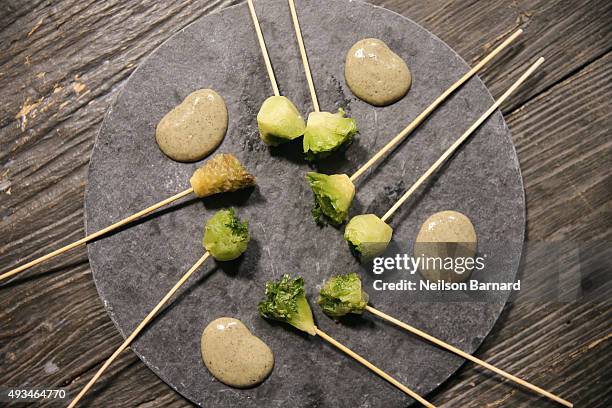 General view of Blue Hill at Stone Barns' Salad Stumps, charcoal mayonnaise at The New York Times Food For Tomorrow Conference 2015 at Stone Barns...