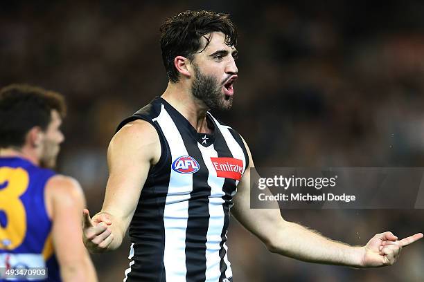Alex Fasolo of the Magpies celebrates a goal during the round 10 AFL match between the Collingwood Magpies and West Coast Eagles at Melbourne Cricket...
