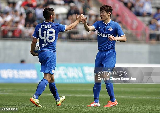 Alex Schalk of PSV Eindhoven celebrates with Park Ji-Sung after score a goal during the friendly match between PSV Eindhoven and Gyeongnam FC at...