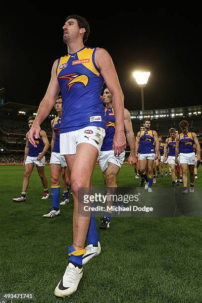 Dean Cox of the Eagles walk offloads the ball in a tackle after losing the round 10 AFL match between the Collingwood Magpies and West Coast Eagles...
