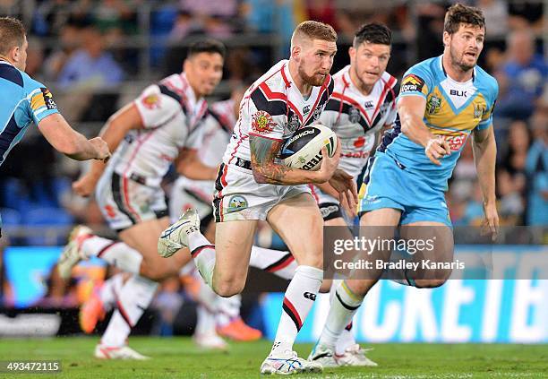 Sam Tomkins of the Warriors breaks away from the defence during the round 11 NRL match between the Gold Coast Titans and the New Zealand Warriors at...