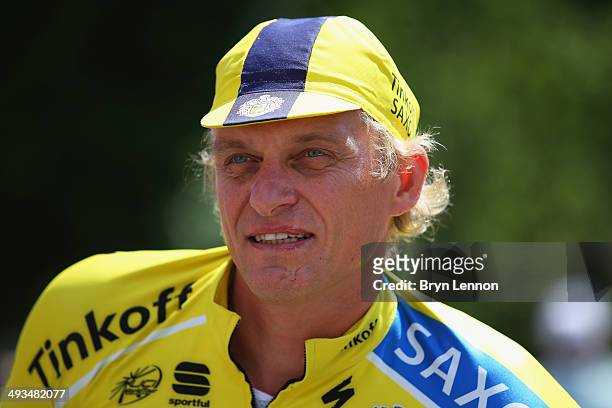 Tinkoff-Saxo team owner Oleg Tinkoff looks on ahead of the fourteenth stage of the 2014 Giro d'Italia, a 164km high mountain stage between Aglie and...