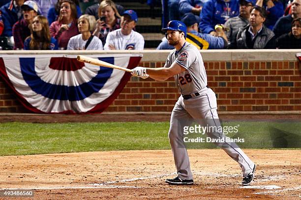 Daniel Murphy of the New York Mets hits a solo home run in the third inning against Kyle Hendricks of the Chicago Cubs during game three of the 2015...