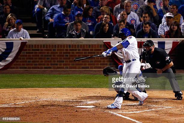 Jorge Soler of the Chicago Cubs hits a solo home run in the fourth inning against Jacob deGrom of the New York Mets during game three of the 2015 MLB...