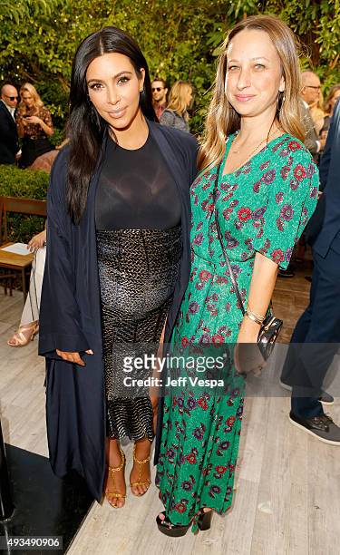 Personality Kim Kardashian and jewelry designer Jennifer Meyer attends CFDA/Vogue Fashion Fund Show and Tea at Chateau Marmont on October 20, 2015 in...