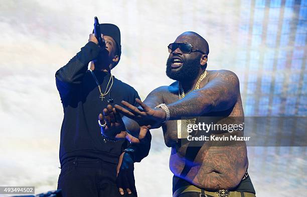 Rappers Jay-Z and Rick Ross perform onstage during TIDAL X: 1020 Amplified by HTC at Barclays Center of Brooklyn on October 20, 2015 in New York City.