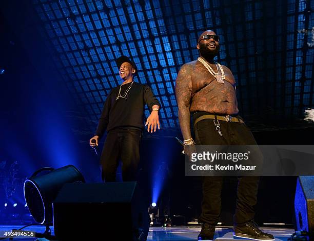 Rappers Jay-Z and Rick Ross perform onstage during TIDAL X: 1020 Amplified by HTC at Barclays Center of Brooklyn on October 20, 2015 in New York City.